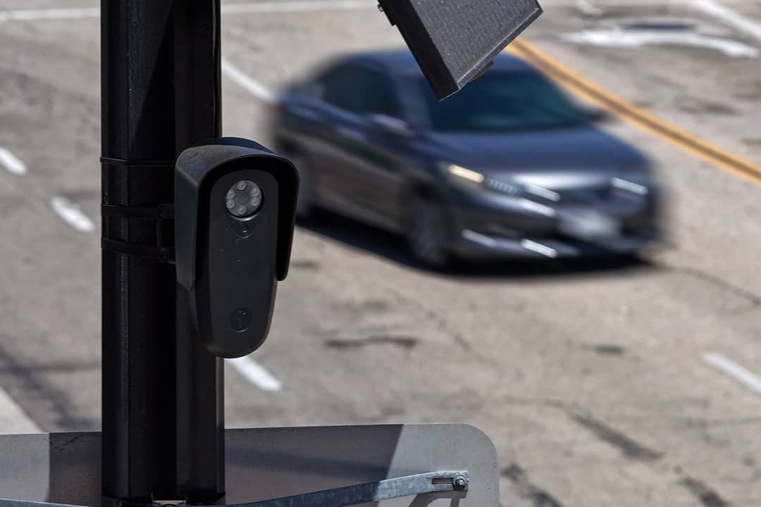A Flock Safety camera mounted to a light pole in Burbank, California.